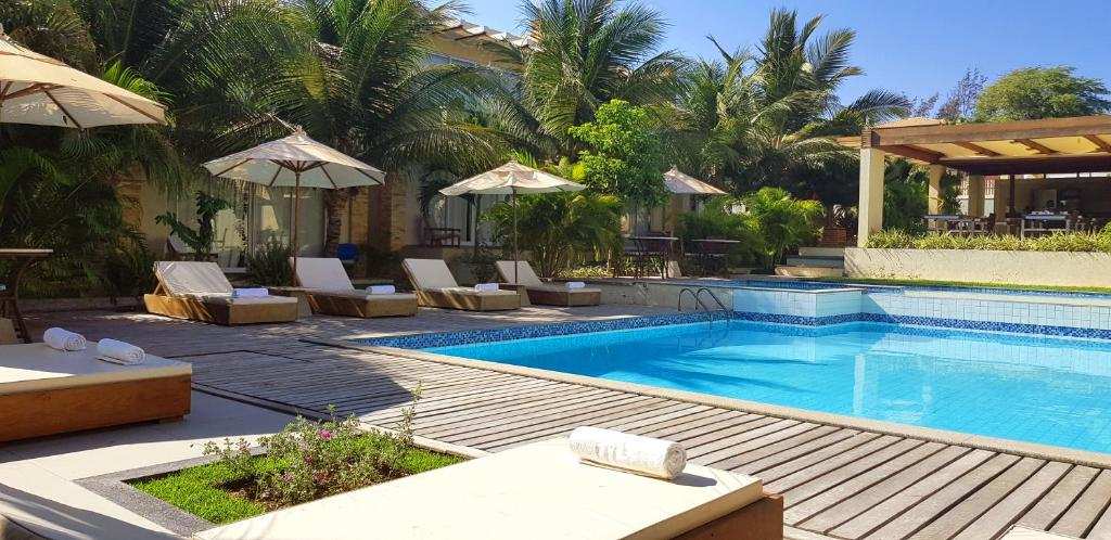 Ravenala Hotel Boutique pool and tropical garden in Canoa Quebrada